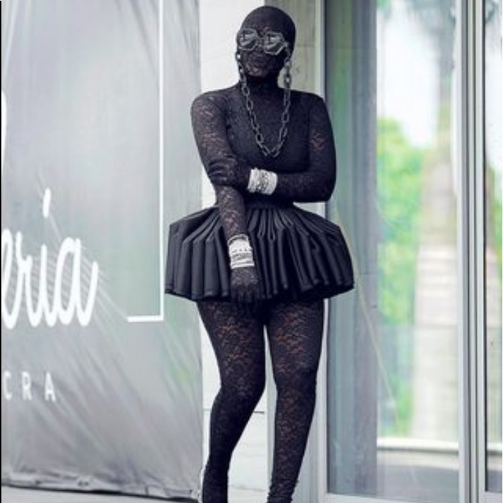 This custom made skirt by Yartelgh size 14 a little stretch
